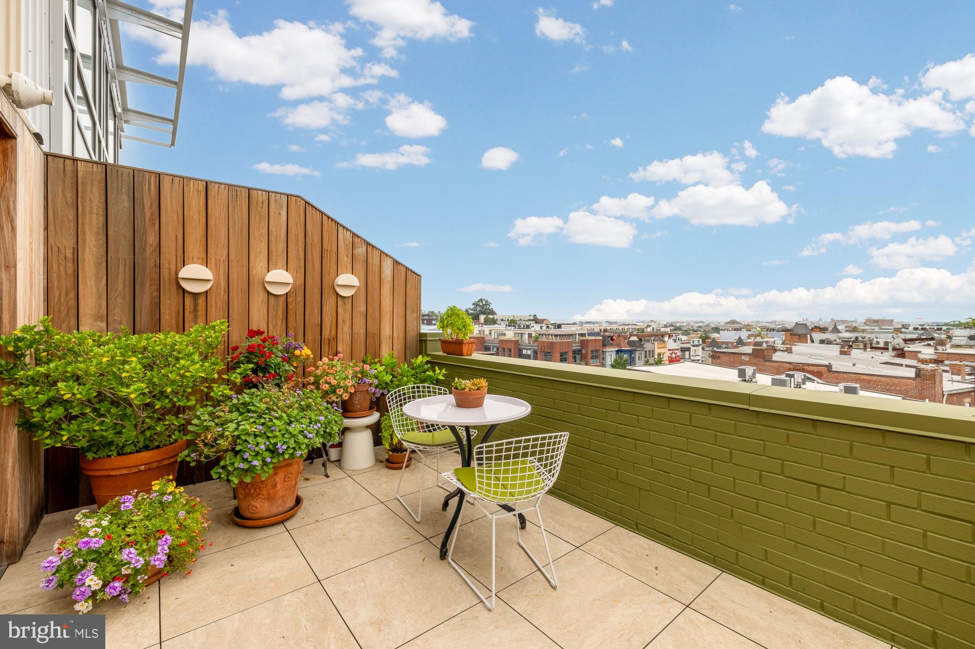 2424 18th Street Northwest, Unit R1 Washington, DC 20009 - Photo 16 of 24 a view of a chairs and table in a terrace