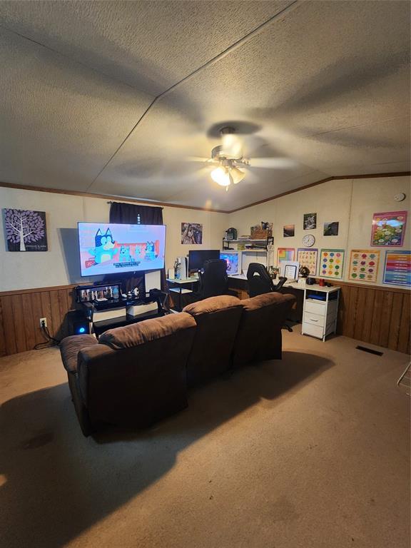 7120 Golden Meadows Road Greenwood, LA 71033 - Photo 2 of 14 a living room with furniture and a kitchen view