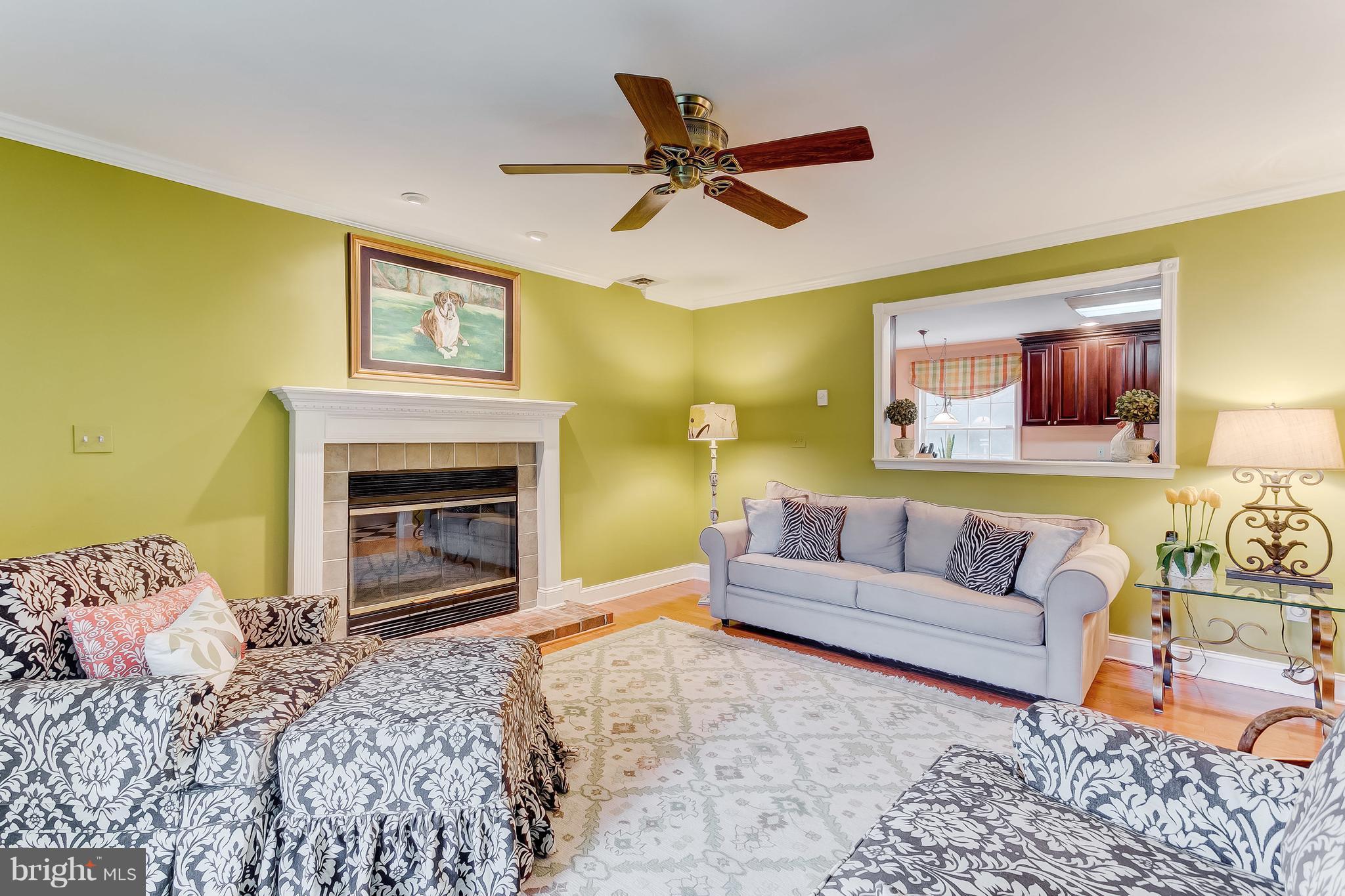 14606 Quaker Bottom Road Sparks, MD 21152 - Photo 13 of 30 a living room with a couch and a fireplace