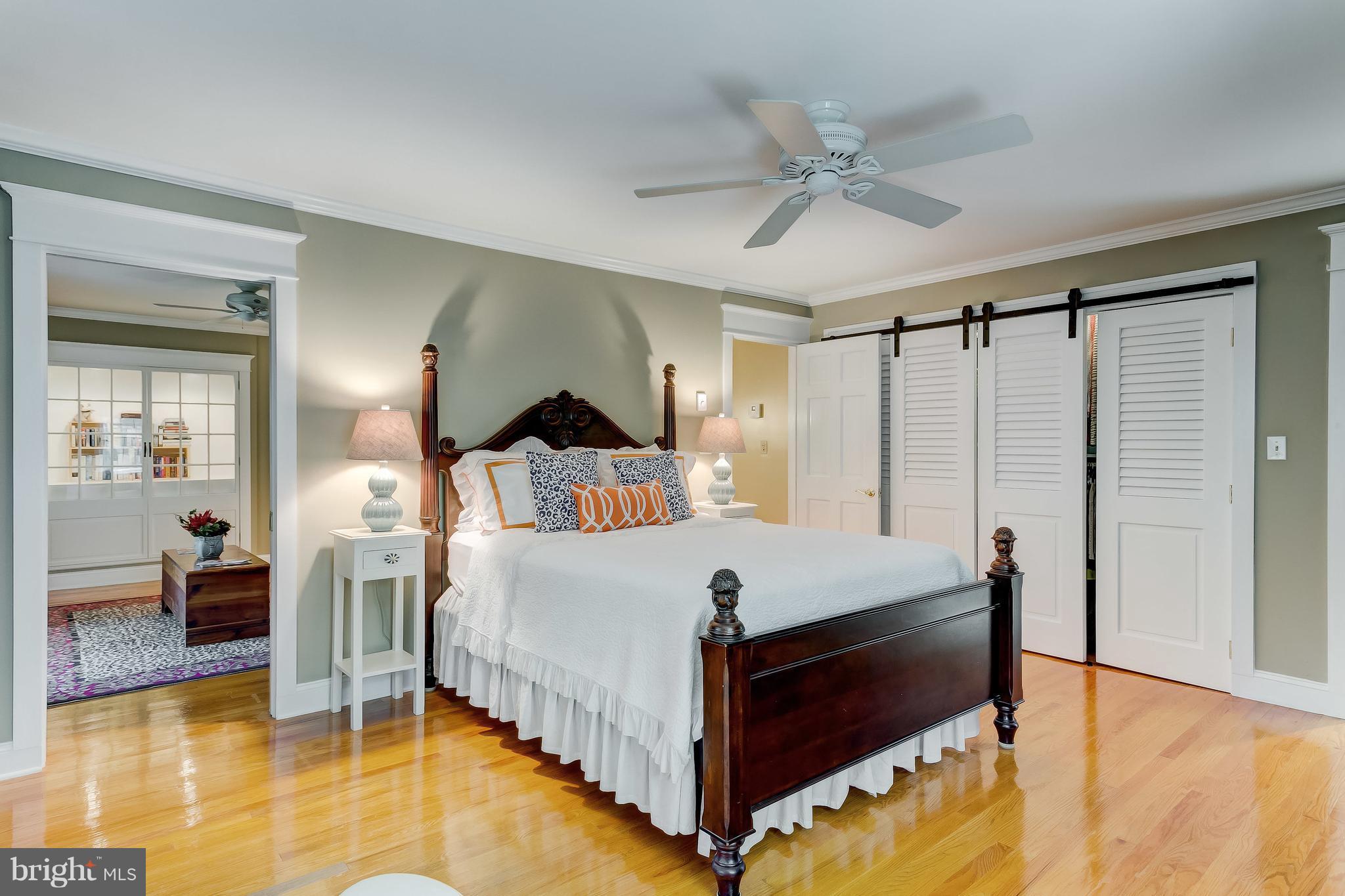 14606 Quaker Bottom Road Sparks, MD 21152 - Photo 15 of 30 a bedroom with a bed and a chandelier