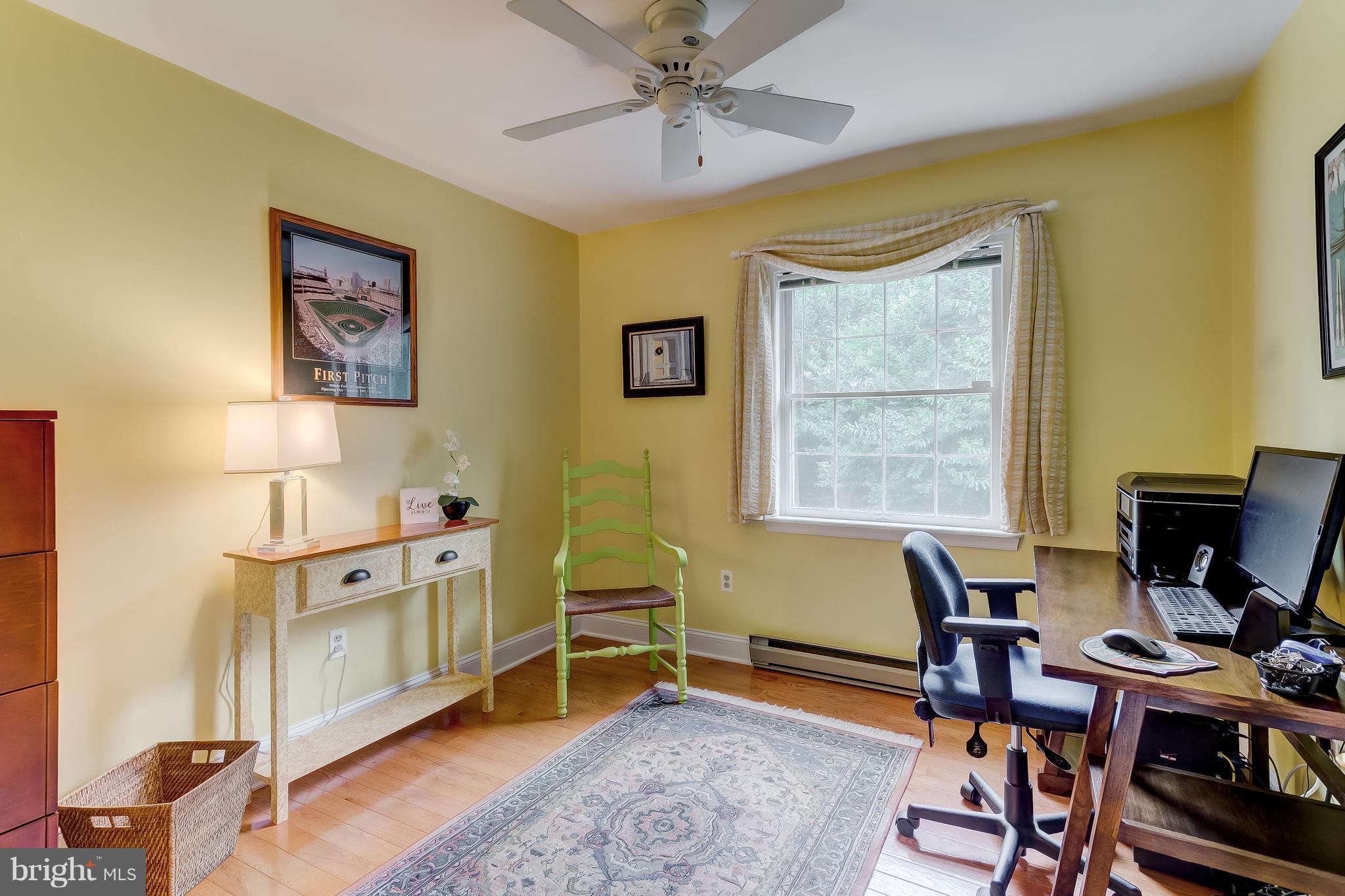 14606 Quaker Bottom Road Sparks, MD 21152 - Photo 21 of 30 a view of a workspace with furniture and a window