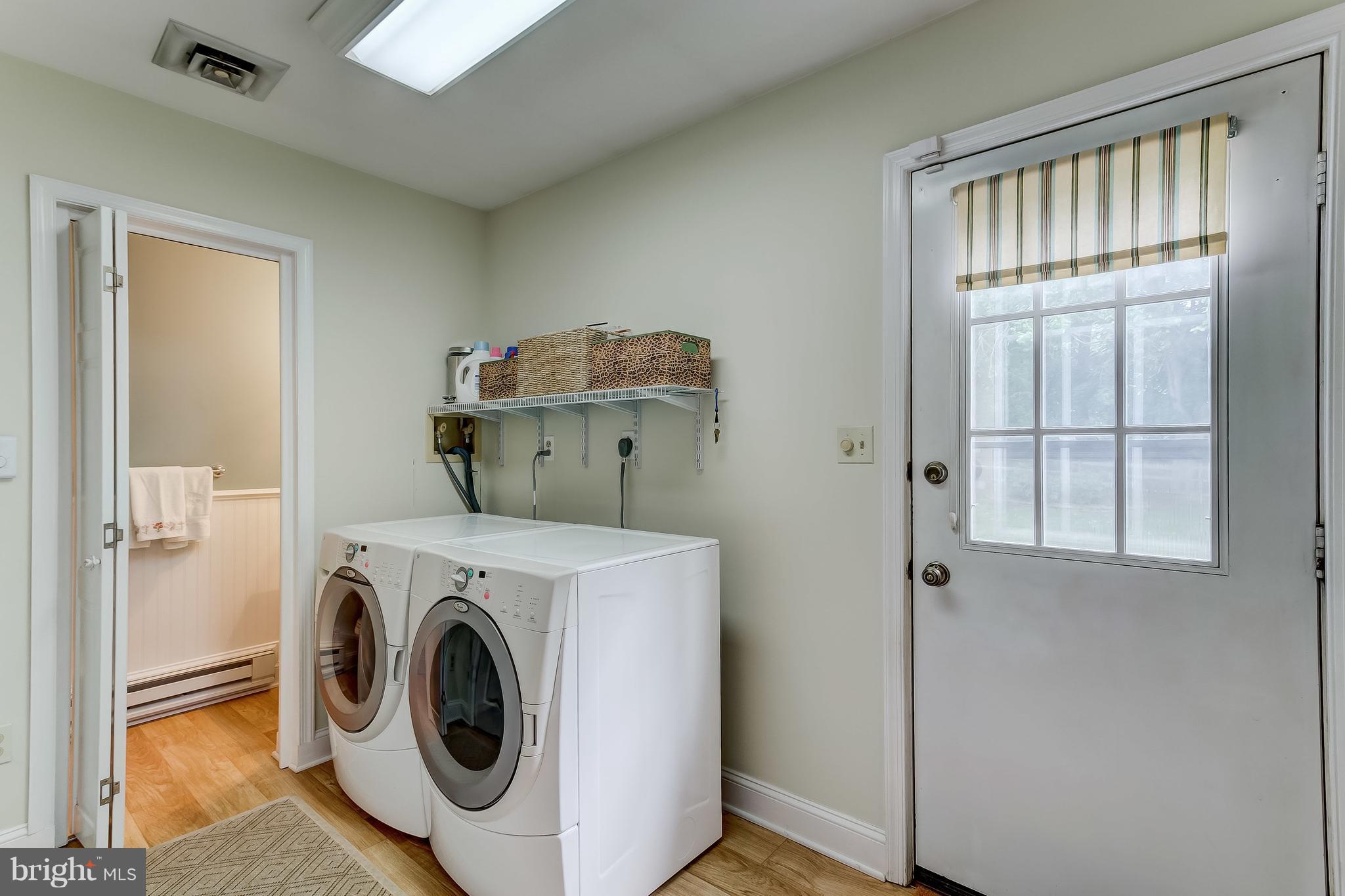 14606 Quaker Bottom Road Sparks, MD 21152 - Photo 24 of 30 a utility room with dryer and washer