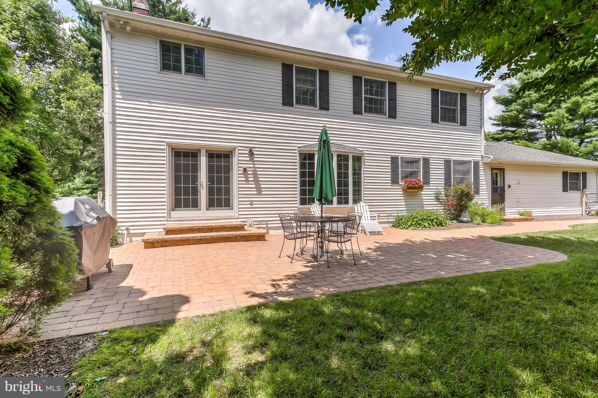 14606 Quaker Bottom Road Sparks, MD 21152 - Photo 25 of 30 a front view of a house with garden