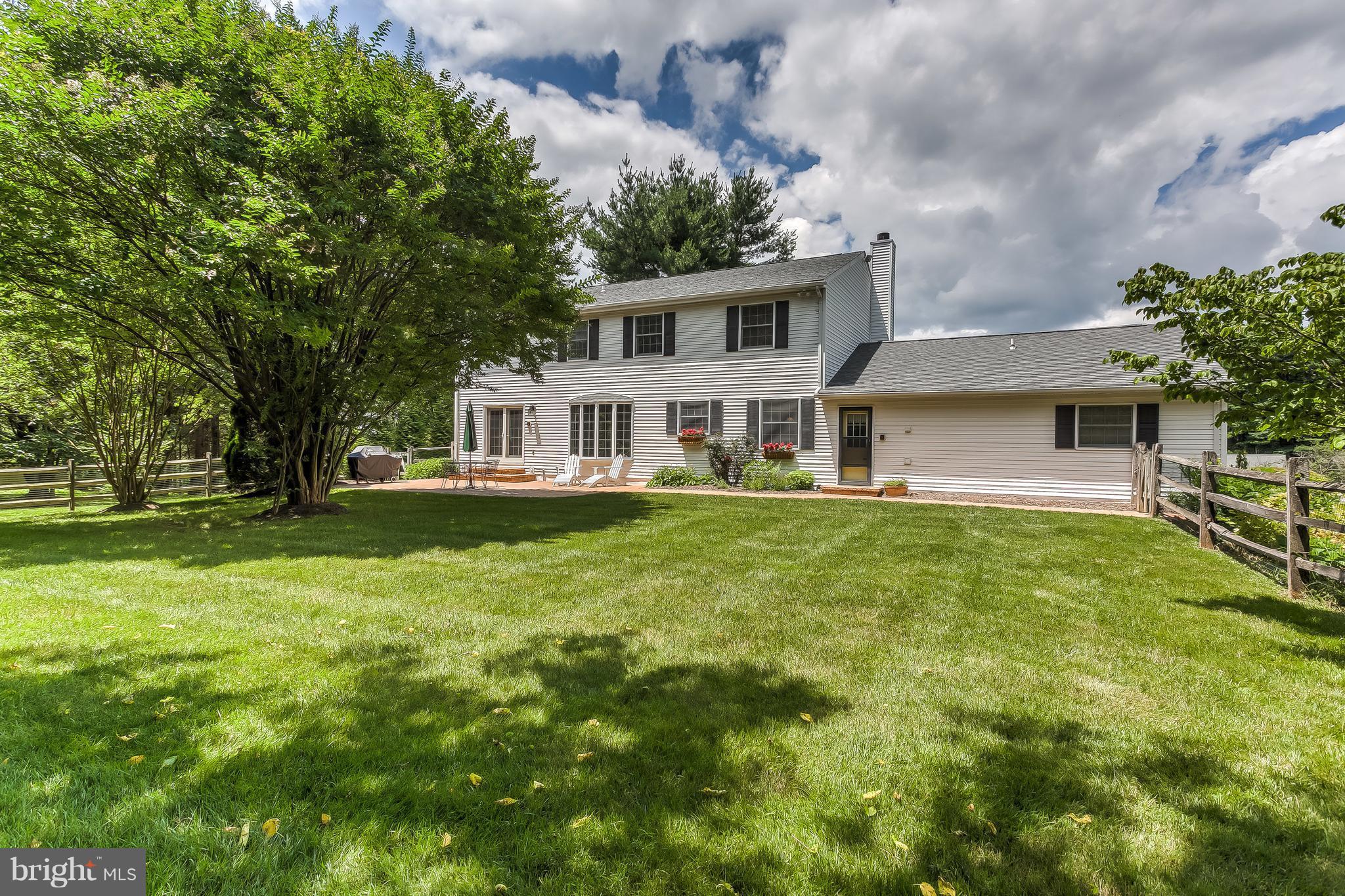 14606 Quaker Bottom Road Sparks, MD 21152 - Photo 27 of 30 a front view of house with yard and green space
