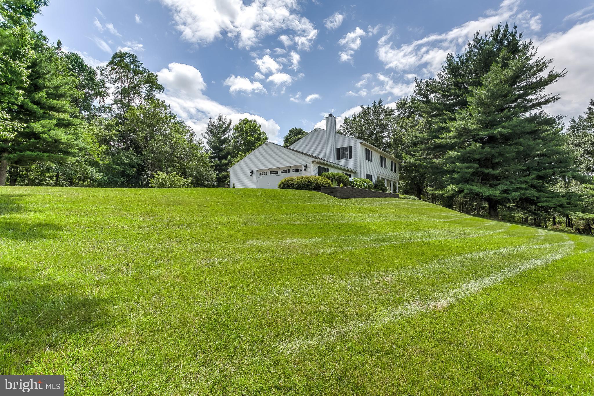 14606 Quaker Bottom Road Sparks, MD 21152 - Photo 29 of 30 a house view with a garden