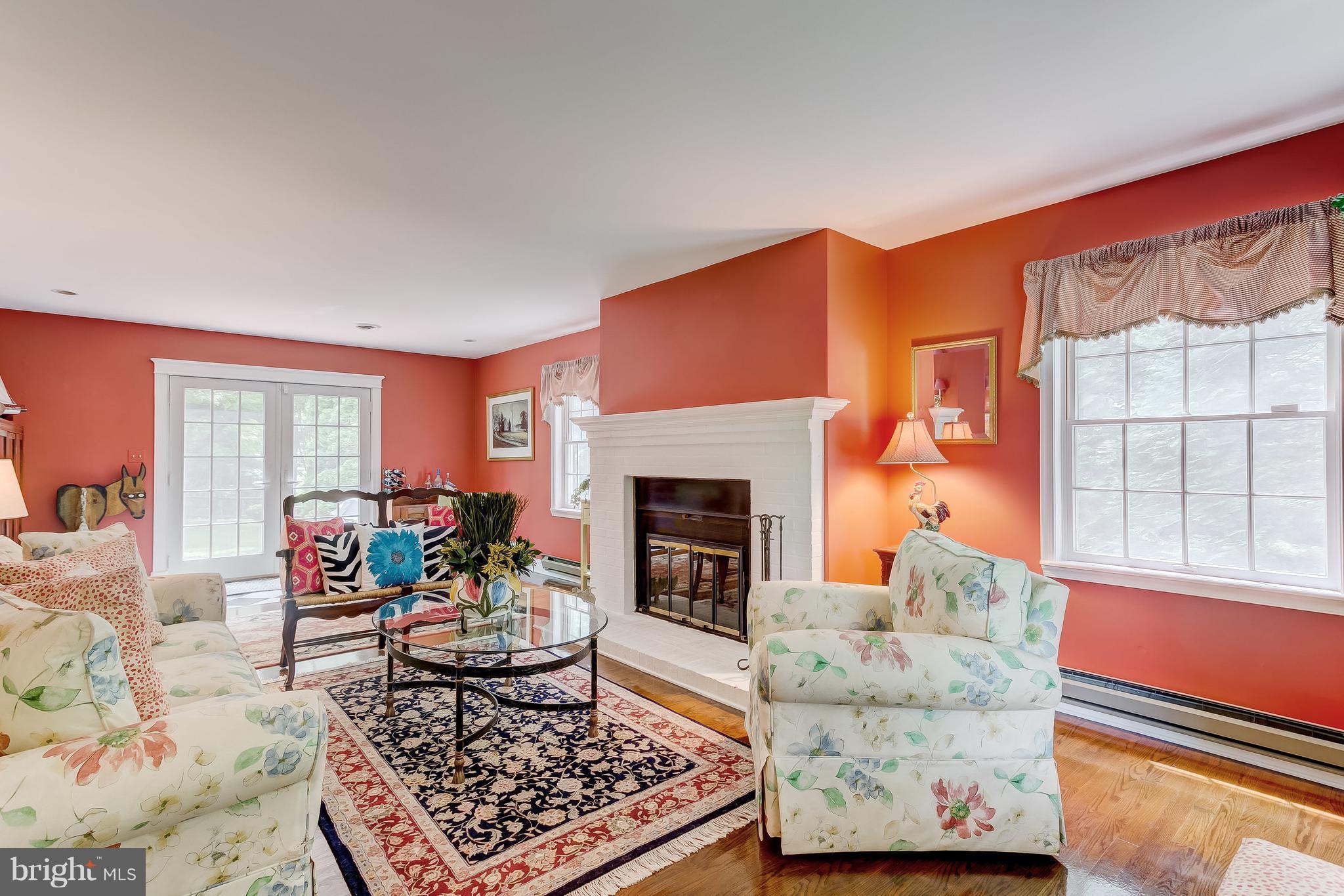 14606 Quaker Bottom Road Sparks, MD 21152 - Photo 5 of 30 a living room with furniture fireplace and window