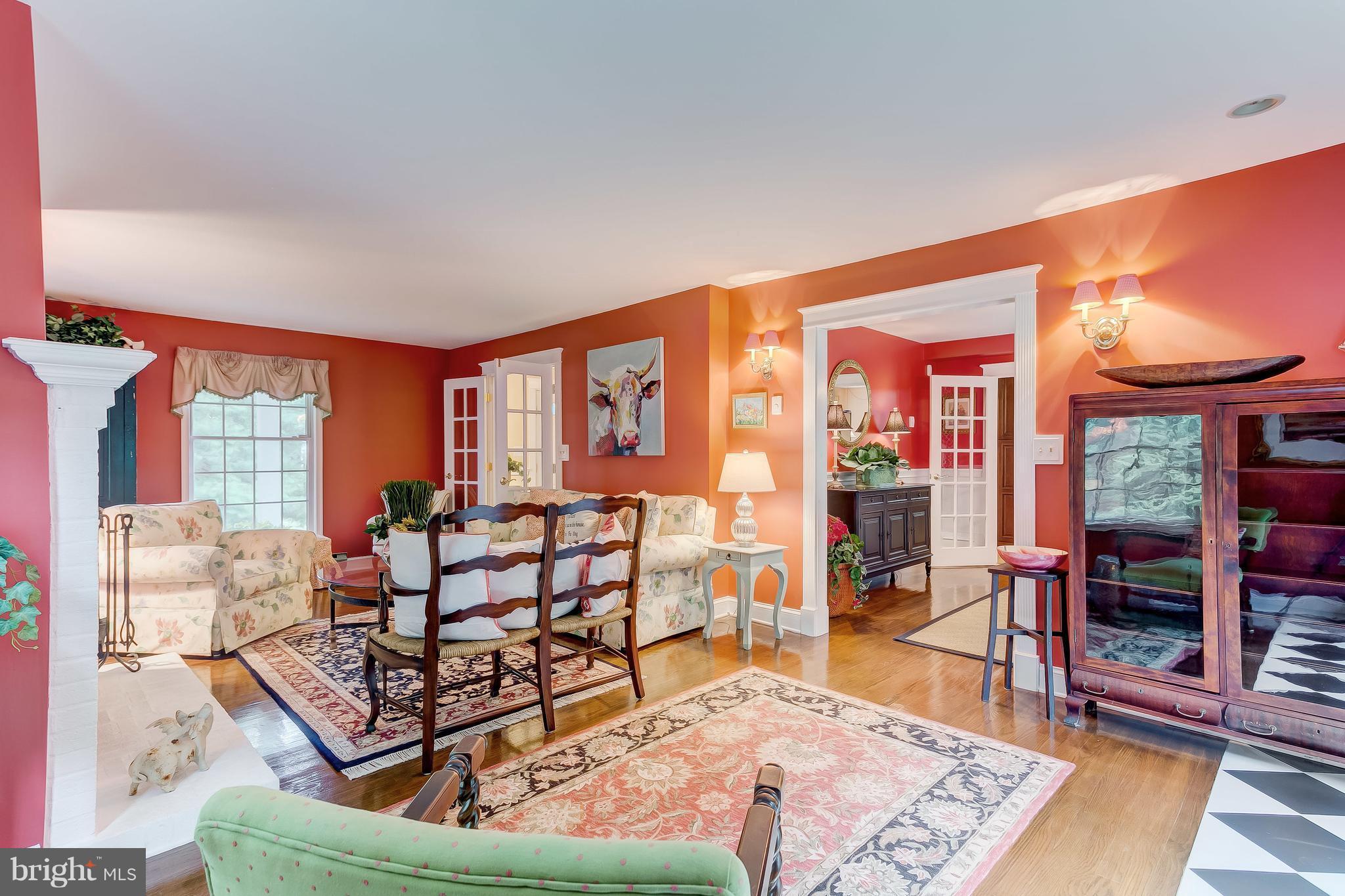 14606 Quaker Bottom Road Sparks, MD 21152 - Photo 6 of 30 a living room with furniture a rug and a floor to ceiling window