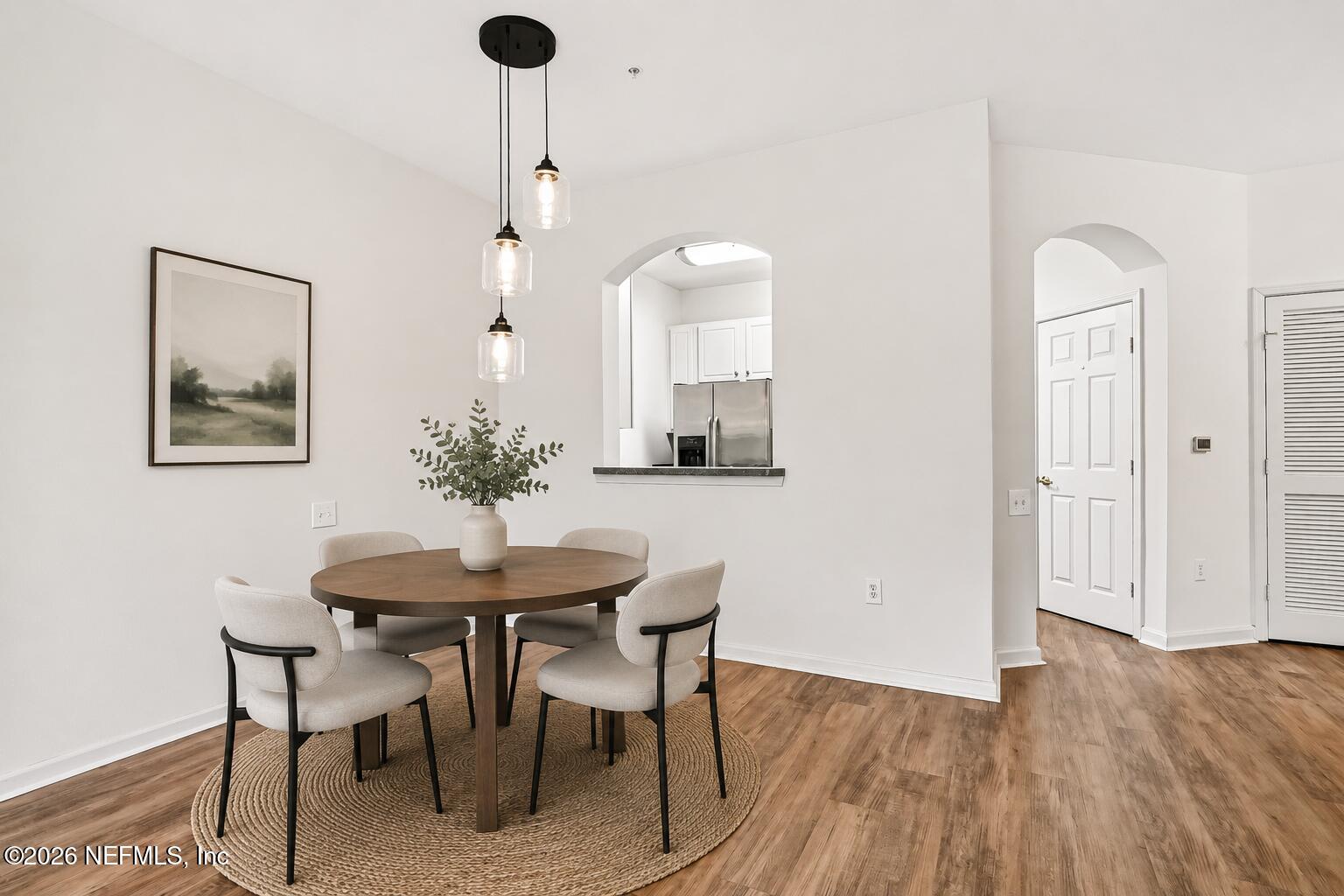 10550 Baymeadows Road, Unit 303 Jacksonville, FL 32256 - Photo 4 of 41 AI Staged Dining Room Area