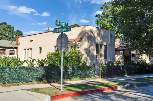 a view of a street with brick building in front of it