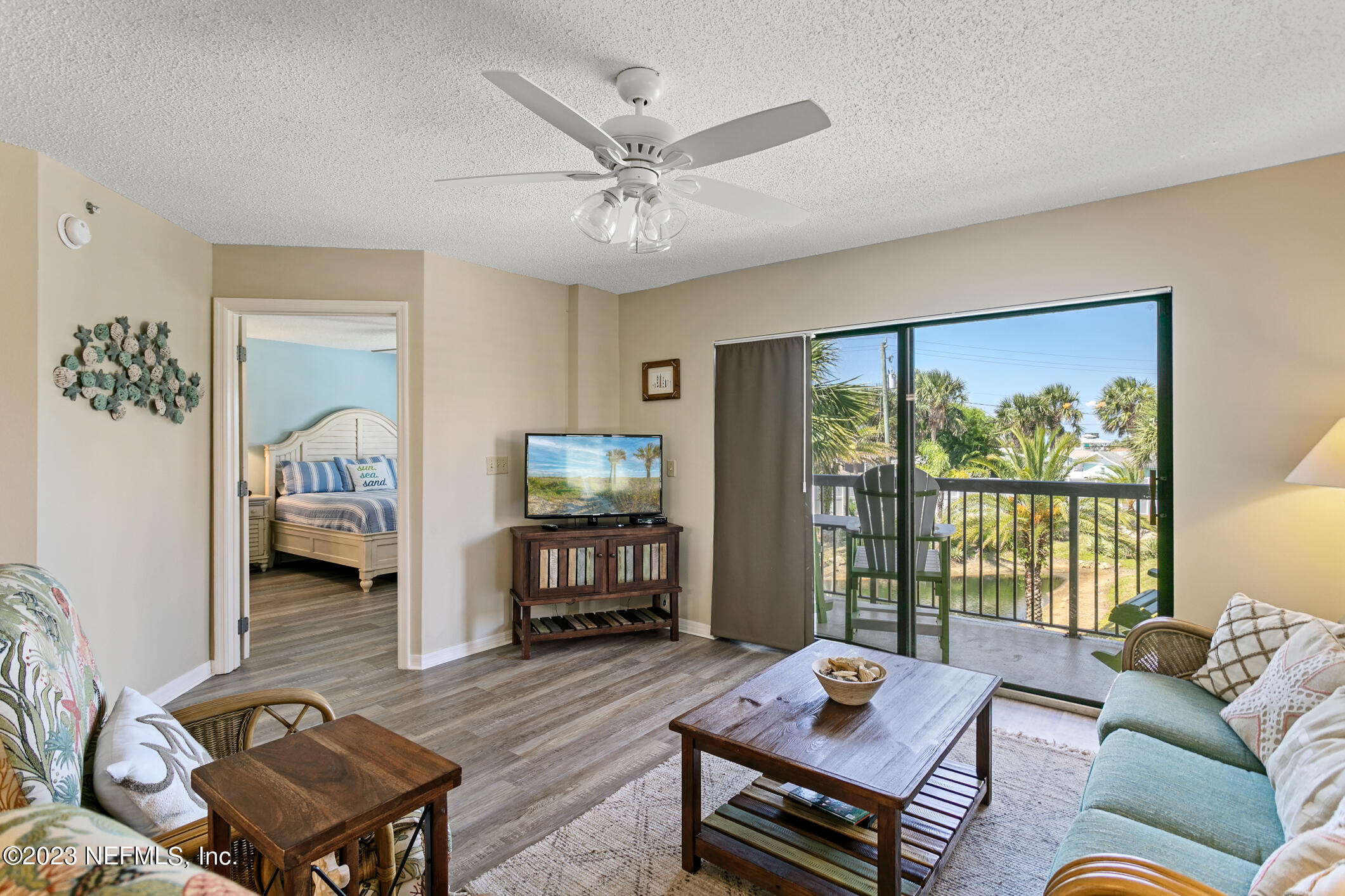 4250 Florida A1A, Unit I26 St. Augustine, FL 32080 - Photo 15 of 49 a living room with furniture and a window