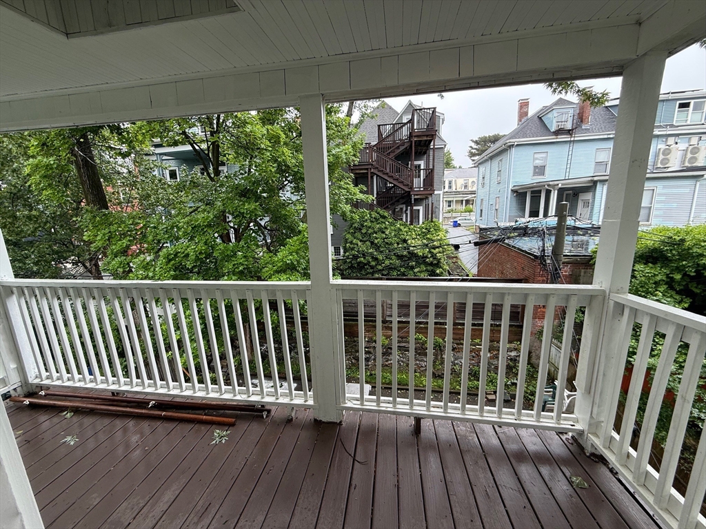 11 Dalrymple Street, Unit 3 Boston, MA 02130 - Photo 13 of 13 a view of a balcony with wooden floor