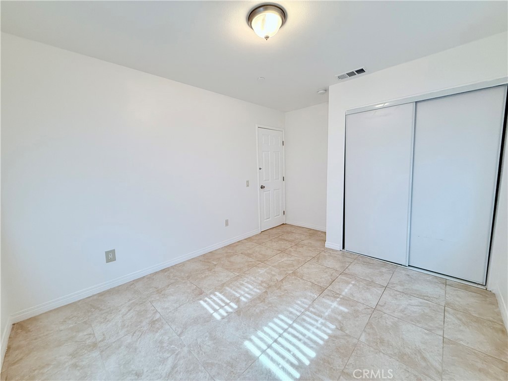 17232 Ceres Avenue Fontana, CA 92335 - Photo 11 of 29 a view of a room with an empty space