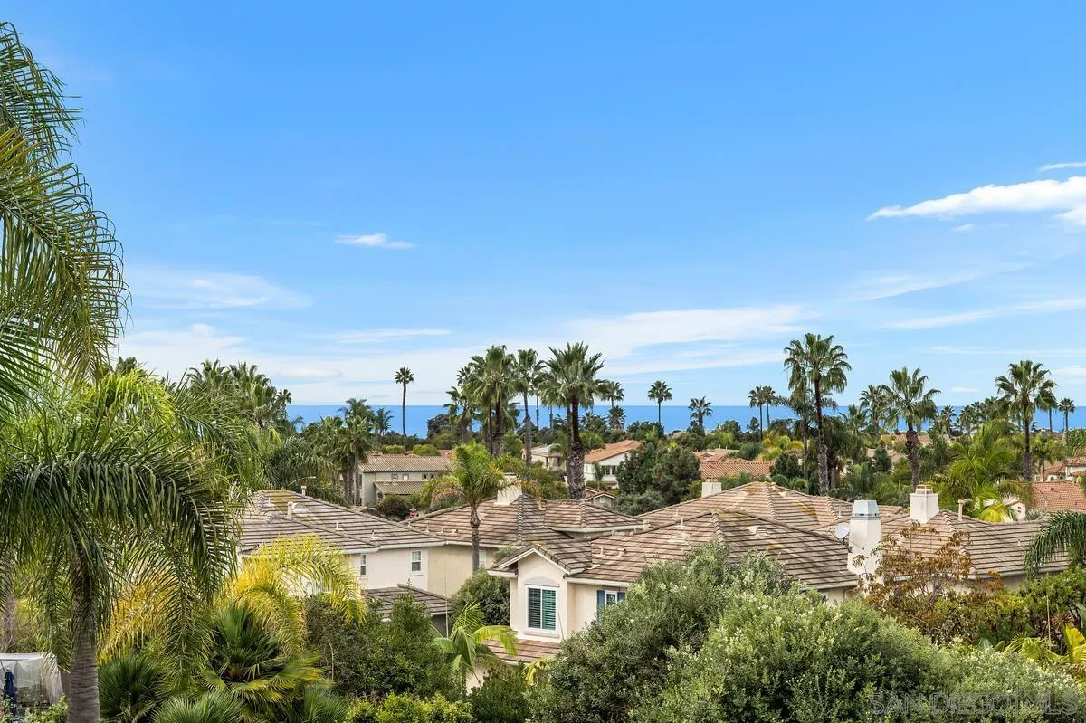 7521 Navigator Circle Carlsbad, CA 92011 - Photo 3 of 41 a view of a lake with houses