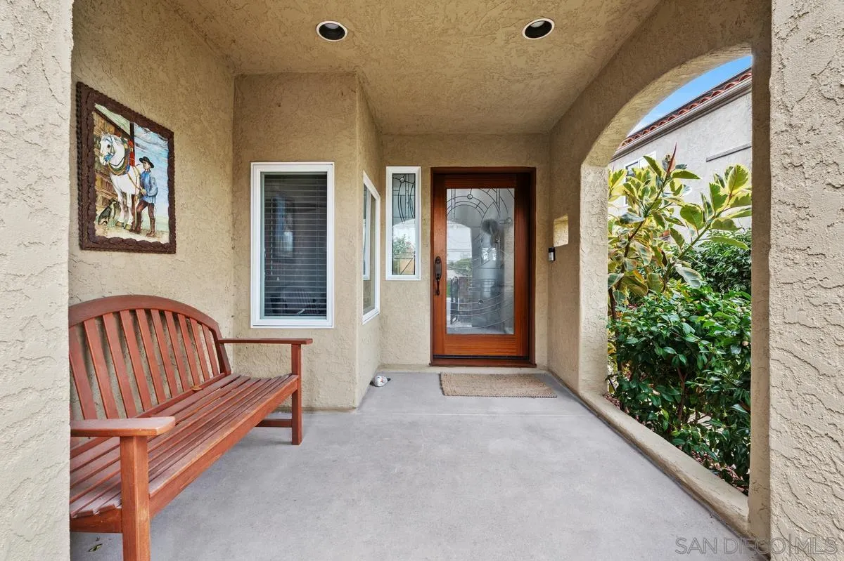 7521 Navigator Circle Carlsbad, CA 92011 - Photo 7 of 41 a living room with furniture and a large window