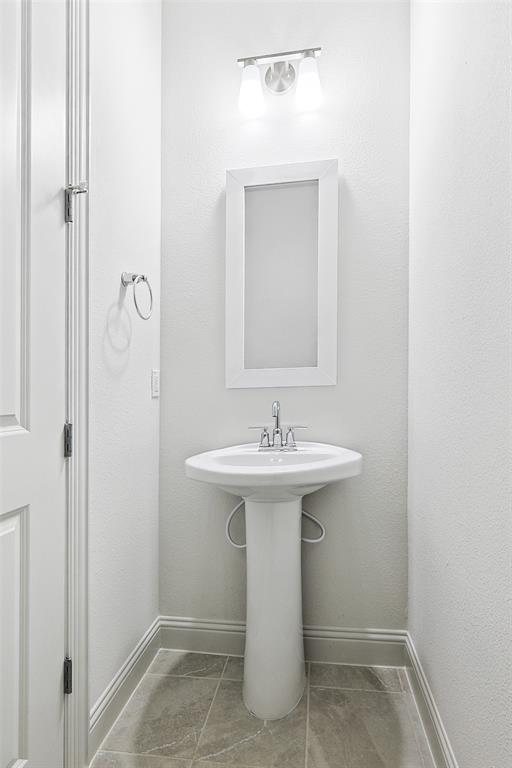 313 Trinity Court Shady Shores, TX 76208 - Photo 21 of 24 Bathroom featuring baseboards