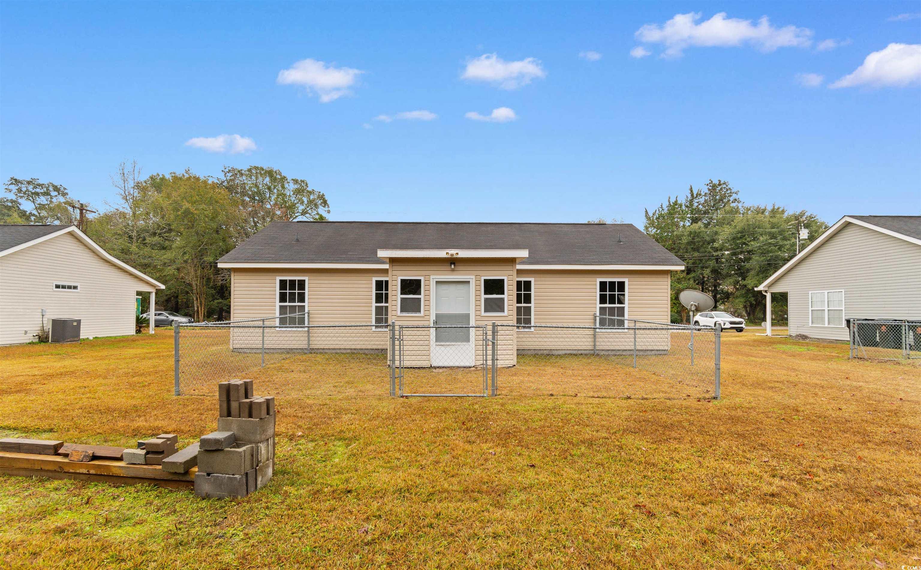 85 Graham Road Georgetown, SC 29440 - Photo 2 of 39 Back of property with a gate