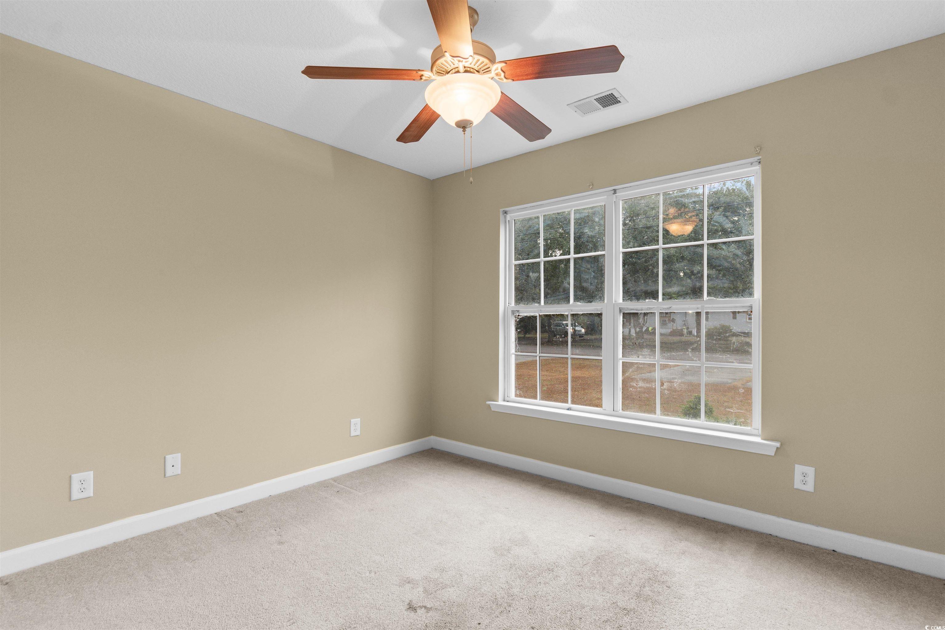 85 Graham Road Georgetown, SC 29440 - Photo 20 of 39 Unfurnished room with light carpet and ceiling fan