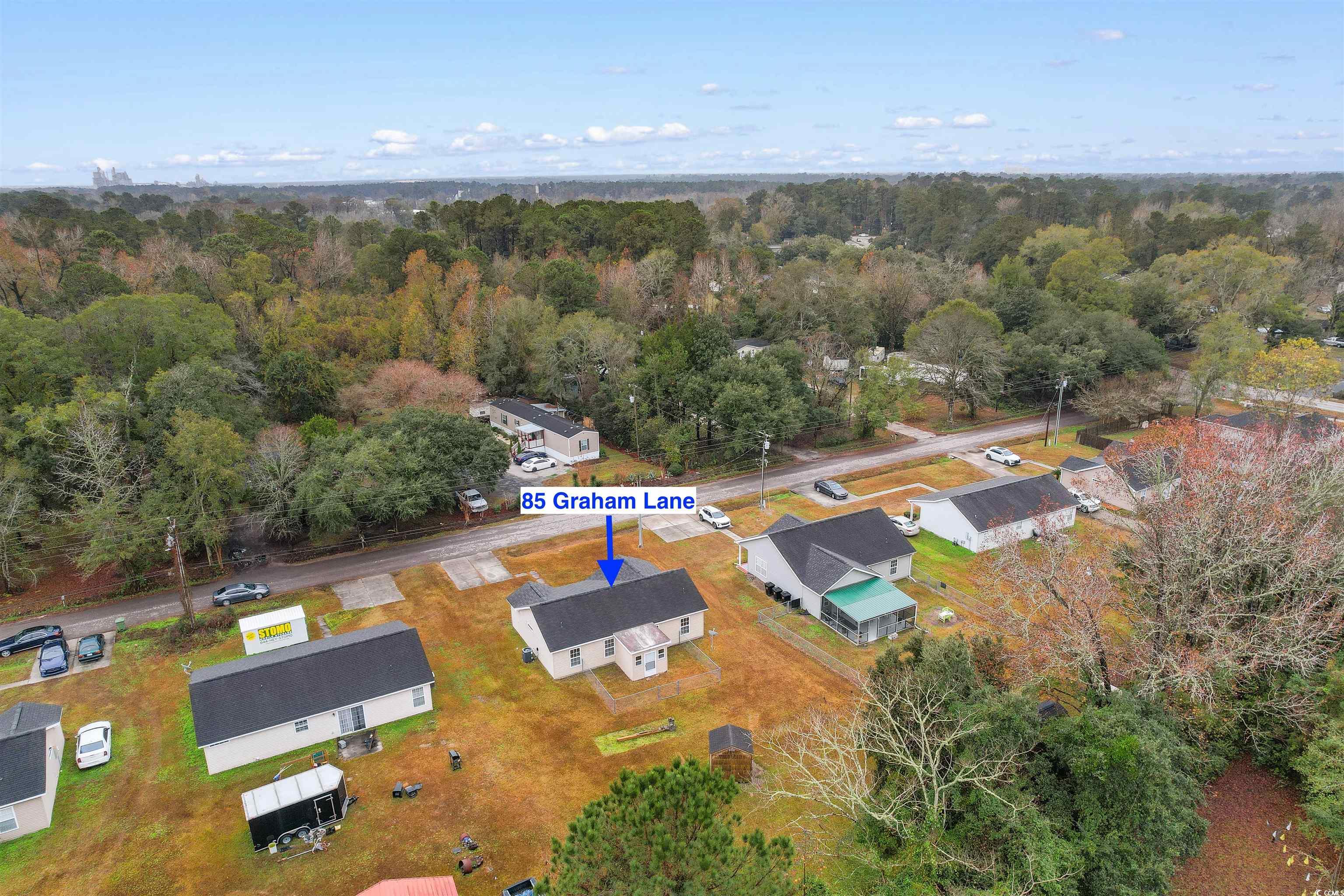 85 Graham Road Georgetown, SC 29440 - Photo 36 of 39 Aerial view of property and surrounding area featuring a forest