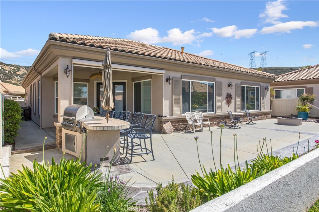 5233 Hampton Road Banning, CA 92220 - Photo 32 of 46 a view of a house with patio