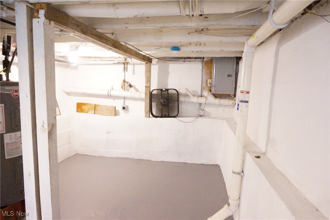 3276 Cottage Grove Road Akron, OH 44319 - Photo 18 of 18 Basement featuring electric panel and water heater