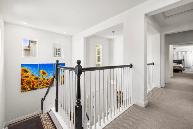 a view of a hallway with workspace