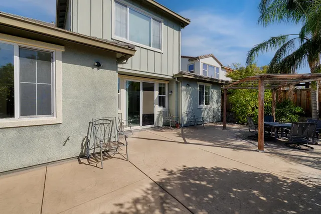 a view of a house with a patio