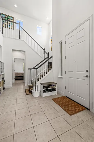 a view of an entryway with wooden floor