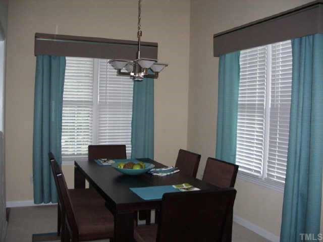 2928 Englefield Drive Raleigh, NC 27615 - Photo 2 of 9 A separate dining room with vaulted ceilings makes all types of meals special! Other