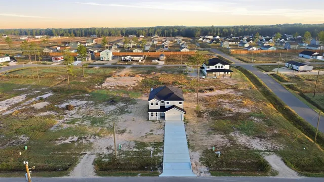 a picture of a bench in front of a wall