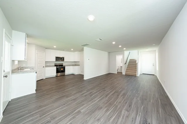 a view of kitchen with wooden floor
