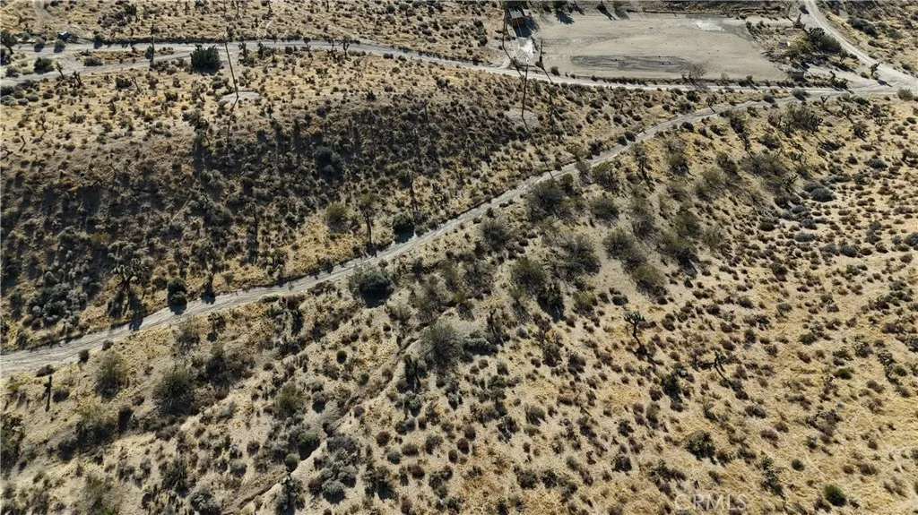 750 Ocotillo Way Apple Valley, CA 92308 - Photo 5 of 11 Red boundary lines on pictures are an estimate and for marketing purposes only. Buyer to verify all aspects of this property including, but not limited to utilities, assessments, boundaries, usage, access, and zoning to satisfy themselves.