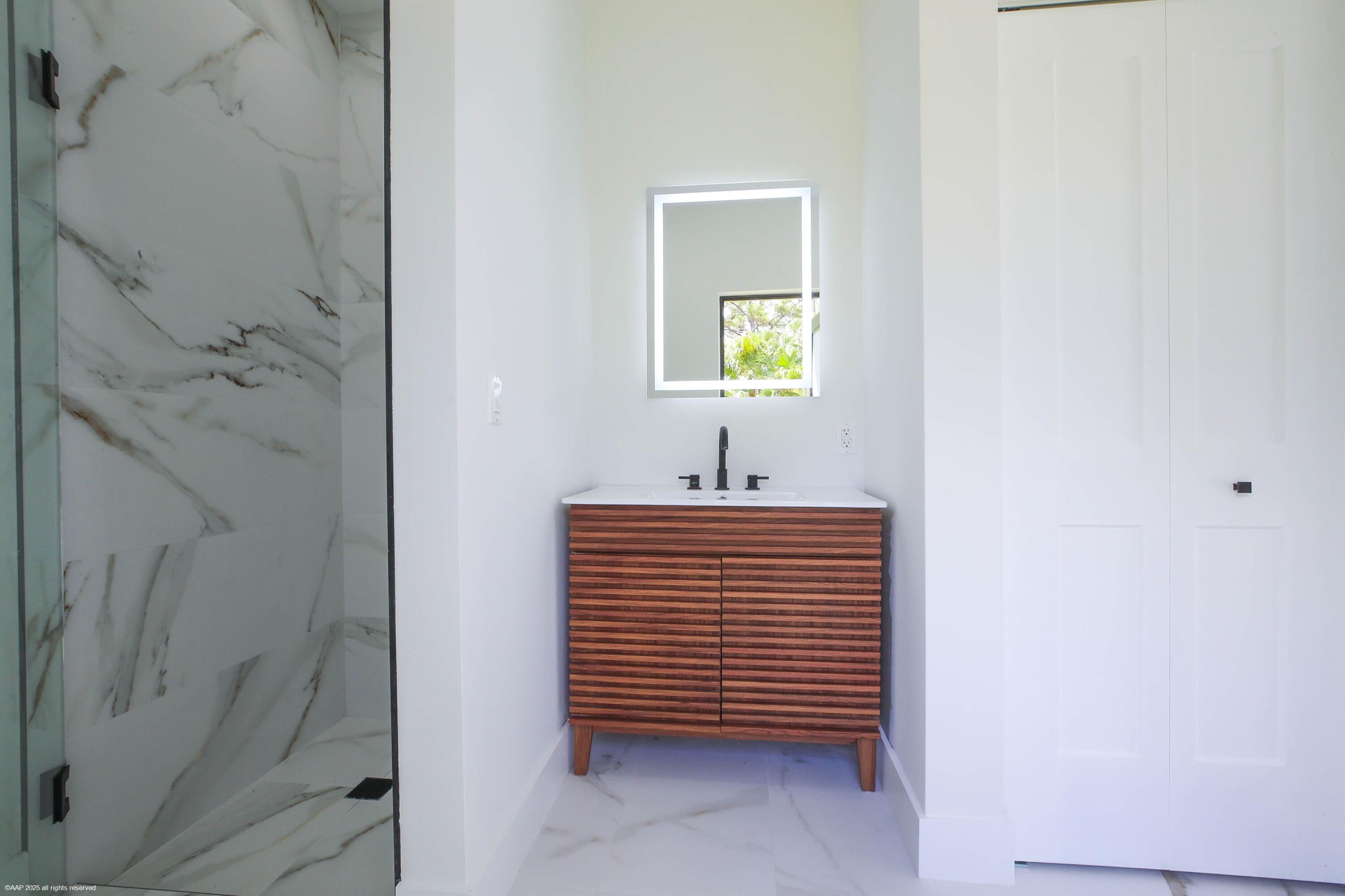 13453 Doubletree Trail Wellington, FL 33414 - Photo 56 of 65 Cabana Bathroom by pool