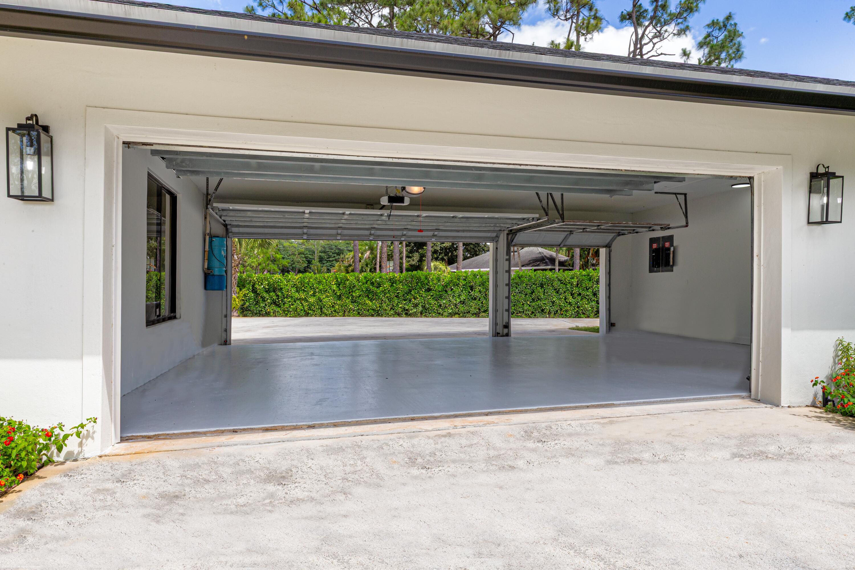 13453 Doubletree Trail Wellington, FL 33414 - Photo 59 of 65 a view of a living room and front door
