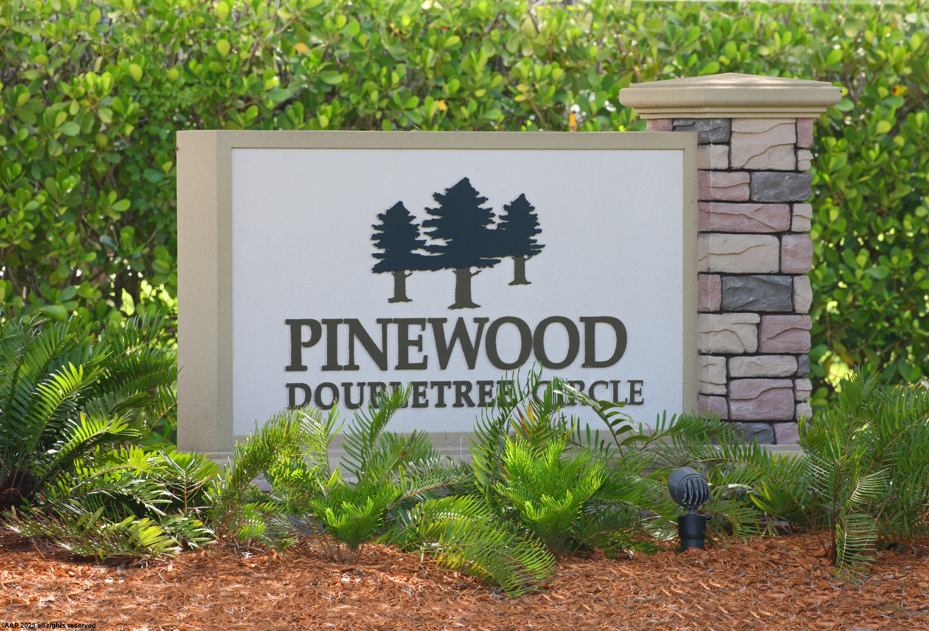 13453 Doubletree Trail Wellington, FL 33414 - Photo 65 of 65 a sign on the side of a building