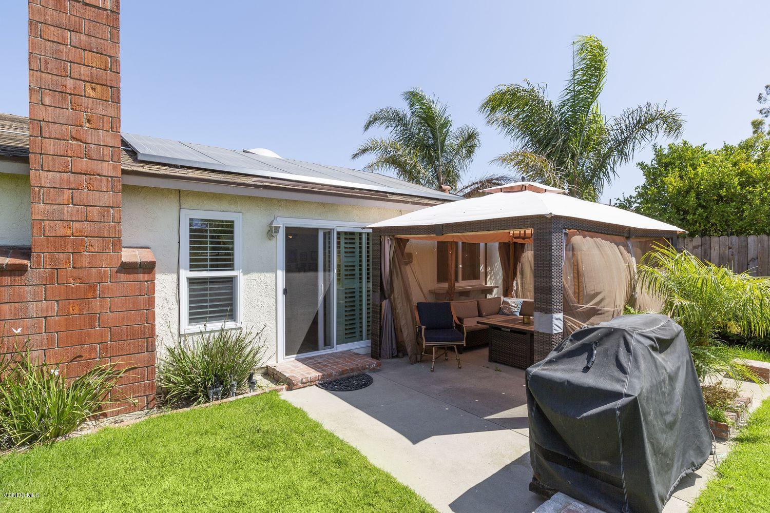 1411 Kelp Street Oxnard, CA 93035 - Photo 21 of 24 a front view of a house with garden