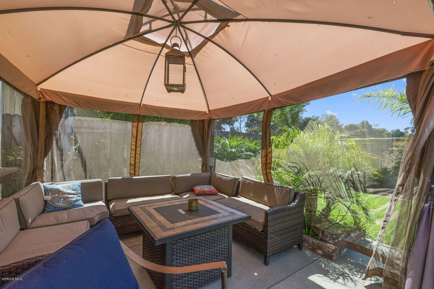 1411 Kelp Street Oxnard, CA 93035 - Photo 22 of 24 a living room with large window and furniture
