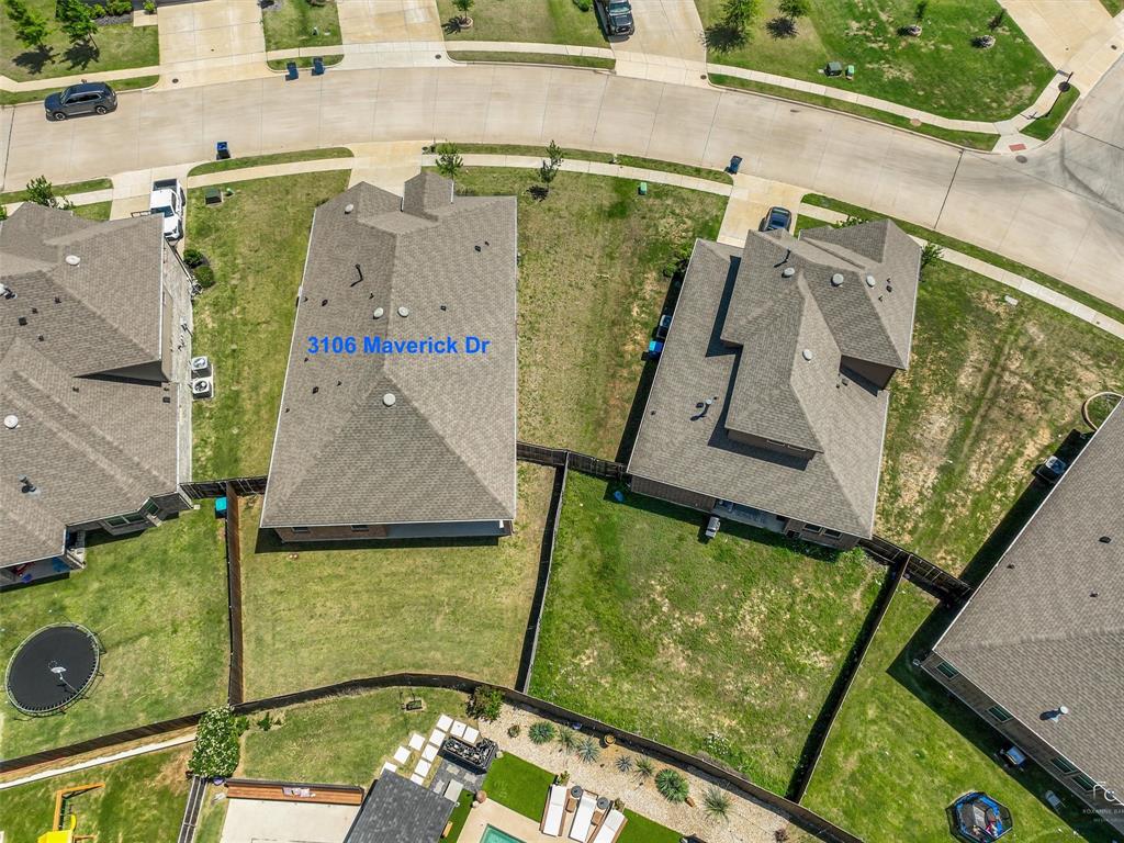 3106 Maverick Drive Forney, TX 75126 - Photo 31 of 32 an aerial view of a house with a swimming pool
