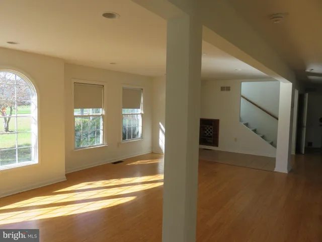a kitchen with a refrigerator and a stove