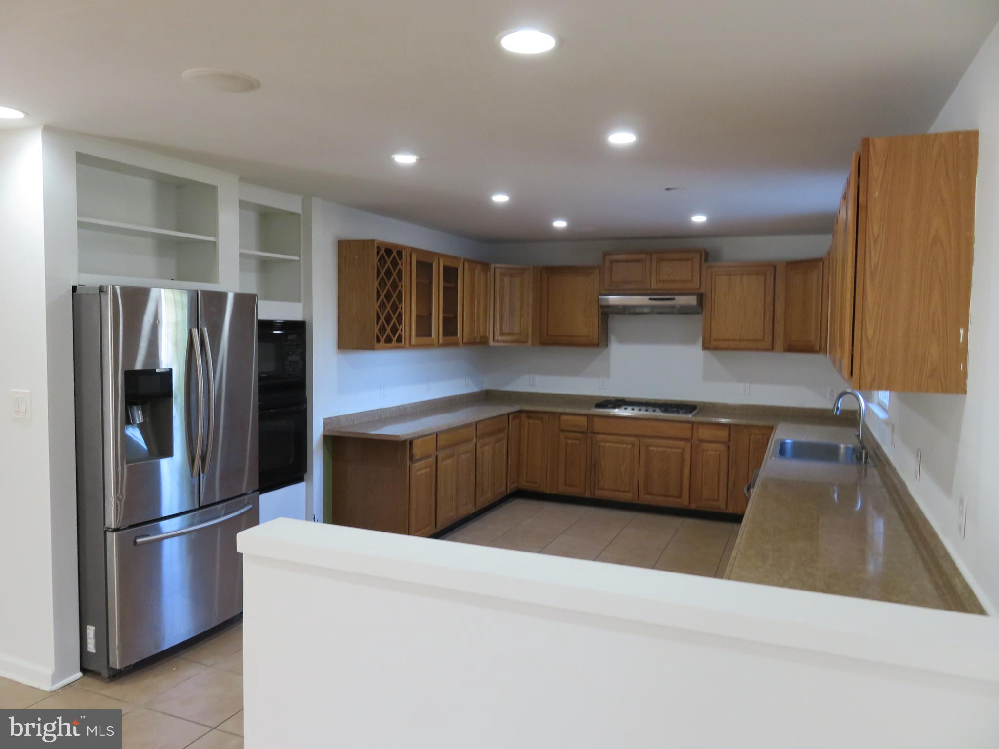 27 Bridle Ridge Circle Lewes, DE 19958 - Photo 15 of 58 View from living area into kitchen