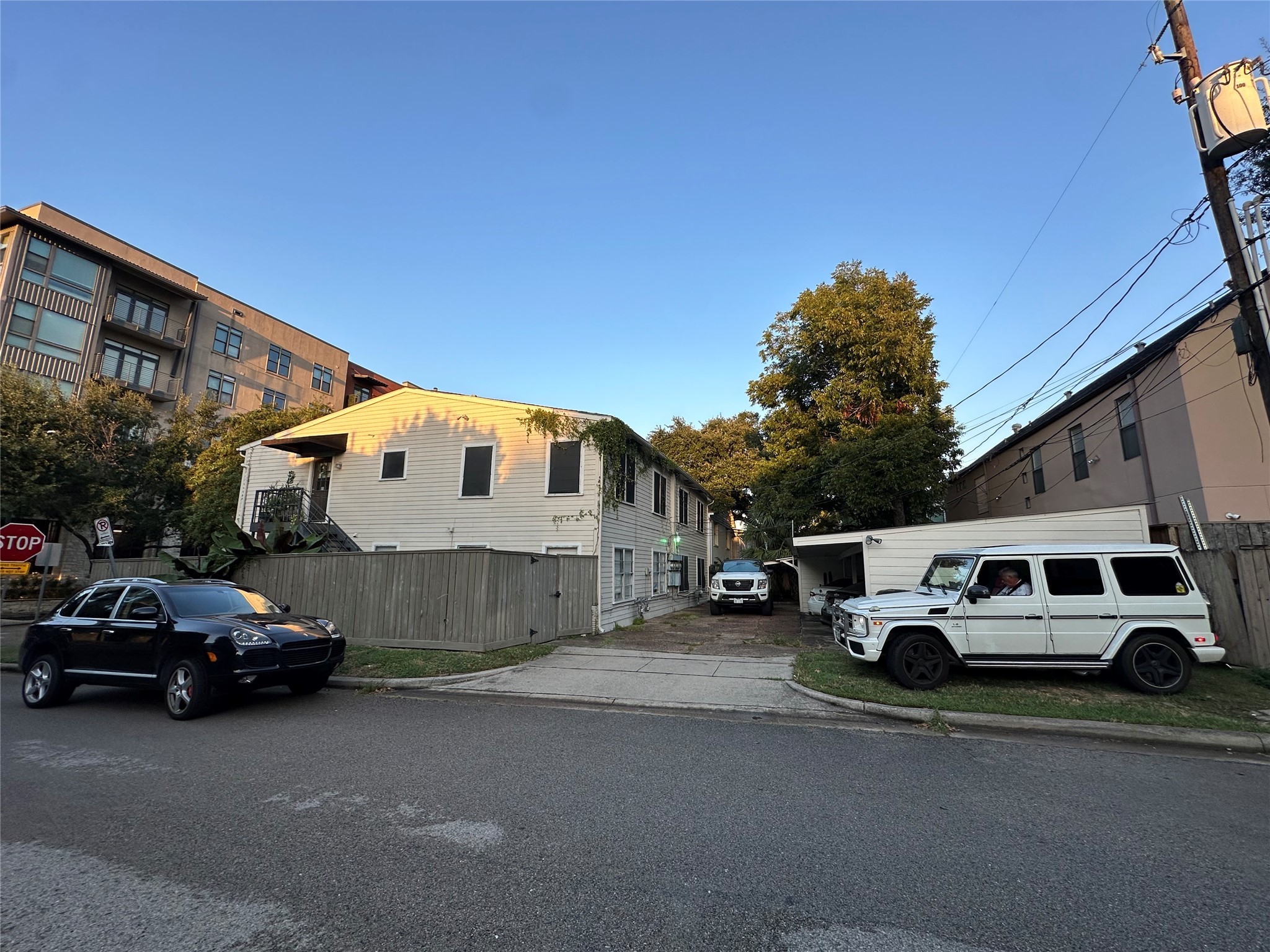 a car parked in front of a house