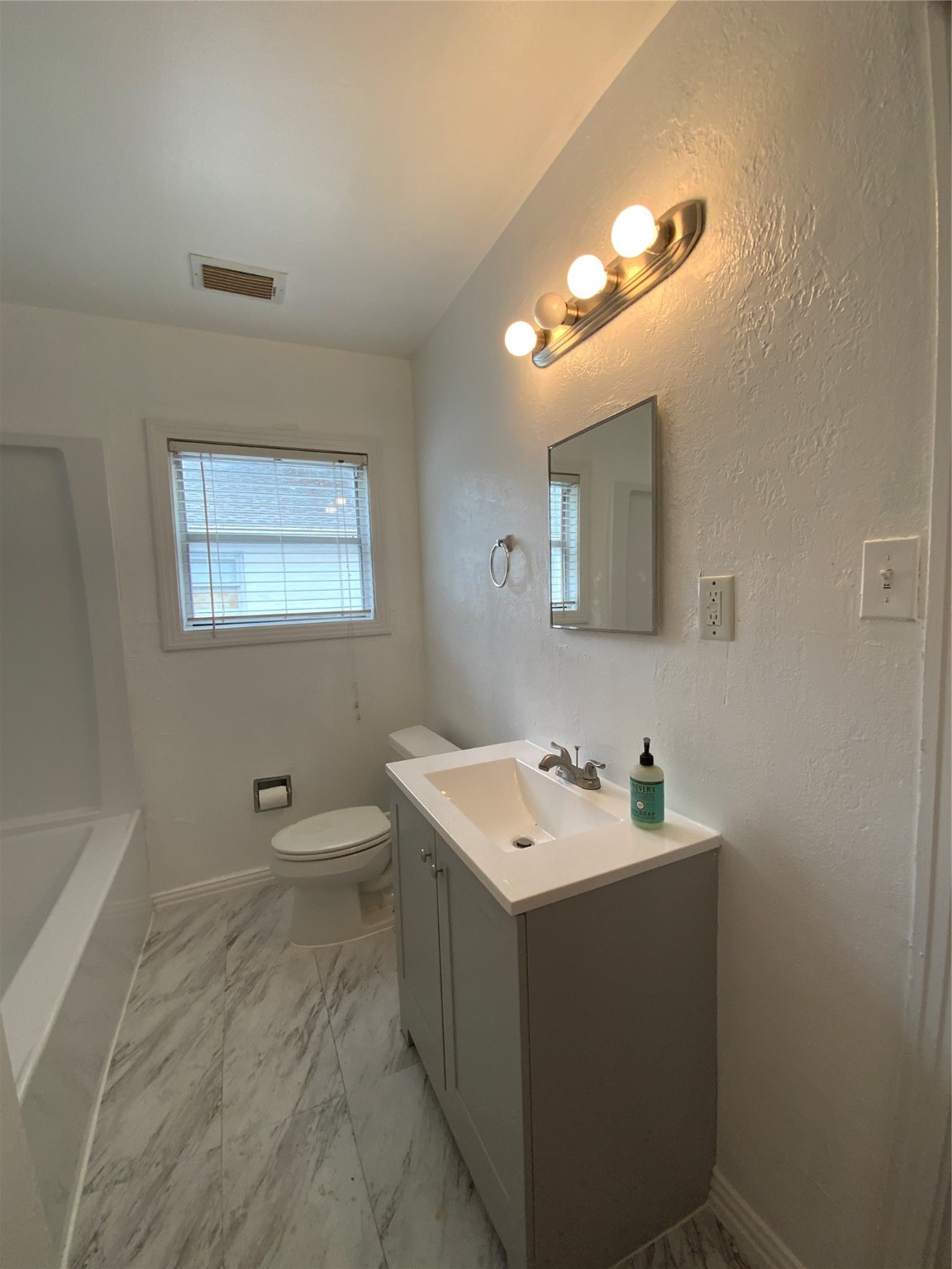 2327 Branard Street, Unit 5 Houston, TX 77098 - Photo 11 of 17 a utility room with dryer and washer