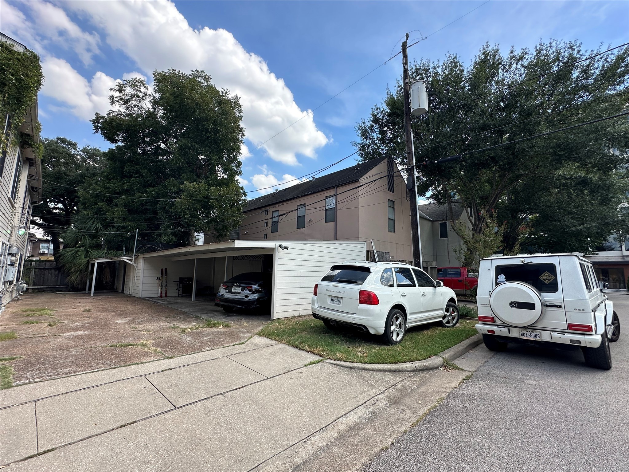 2327 Branard Street, Unit 5 Houston, TX 77098 - Photo 15 of 17 a view of a cars parking space