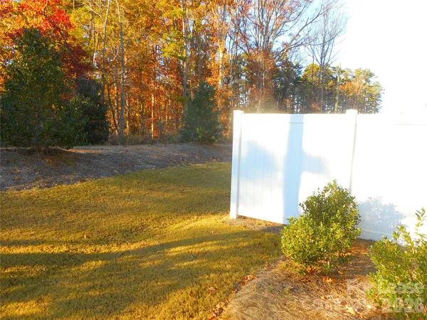 a view of a yard with an outdoor space