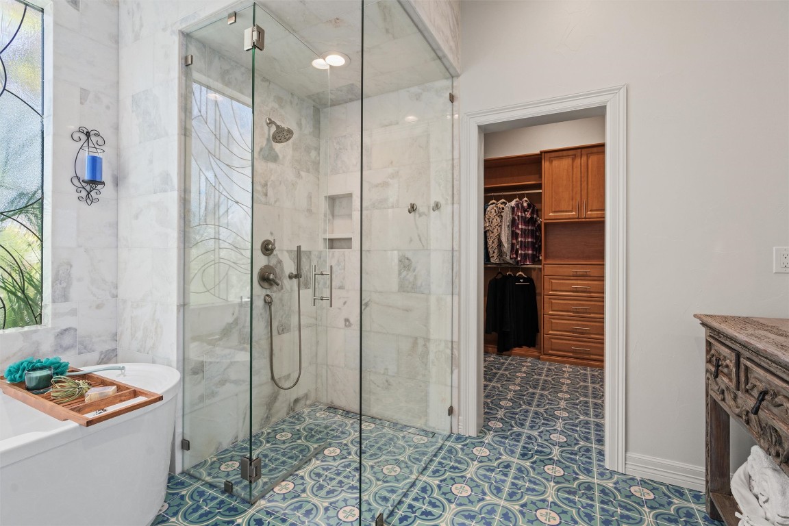 5706 Long Court Austin, TX 78730 - Photo 26 of 40 a bathroom with a shower and a sink