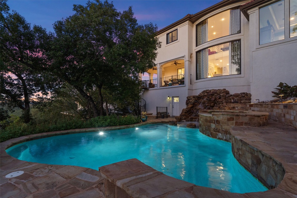 5706 Long Court Austin, TX 78730 - Photo 3 of 40 a backyard of a house with lots of green space