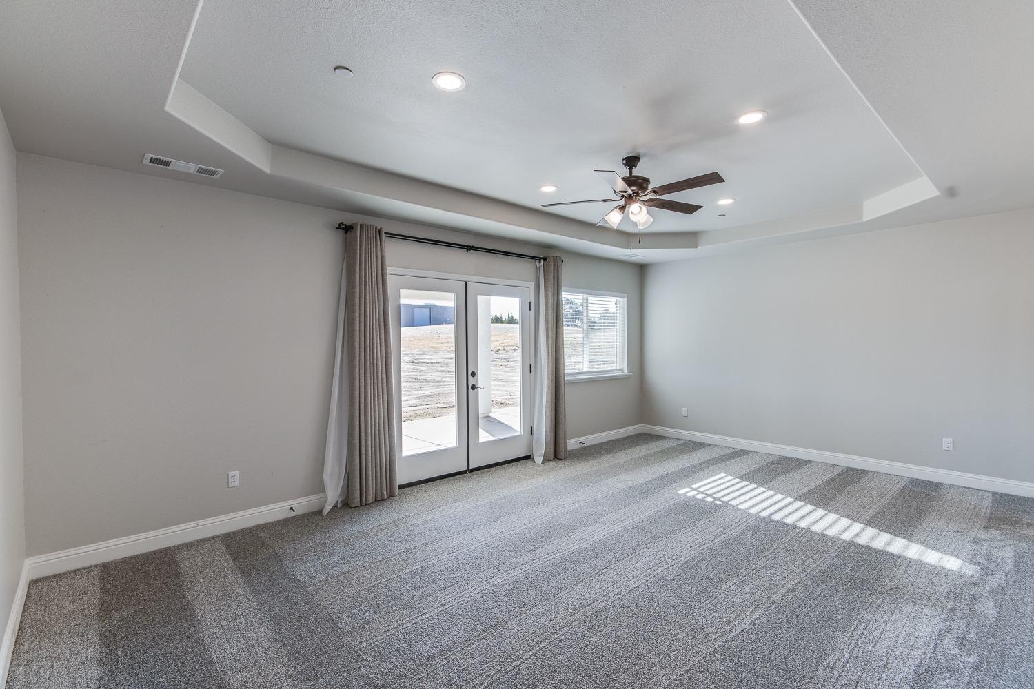 16639 Mark Road Madera, CA 93636 - Photo 18 of 33 a view of an empty room with a window