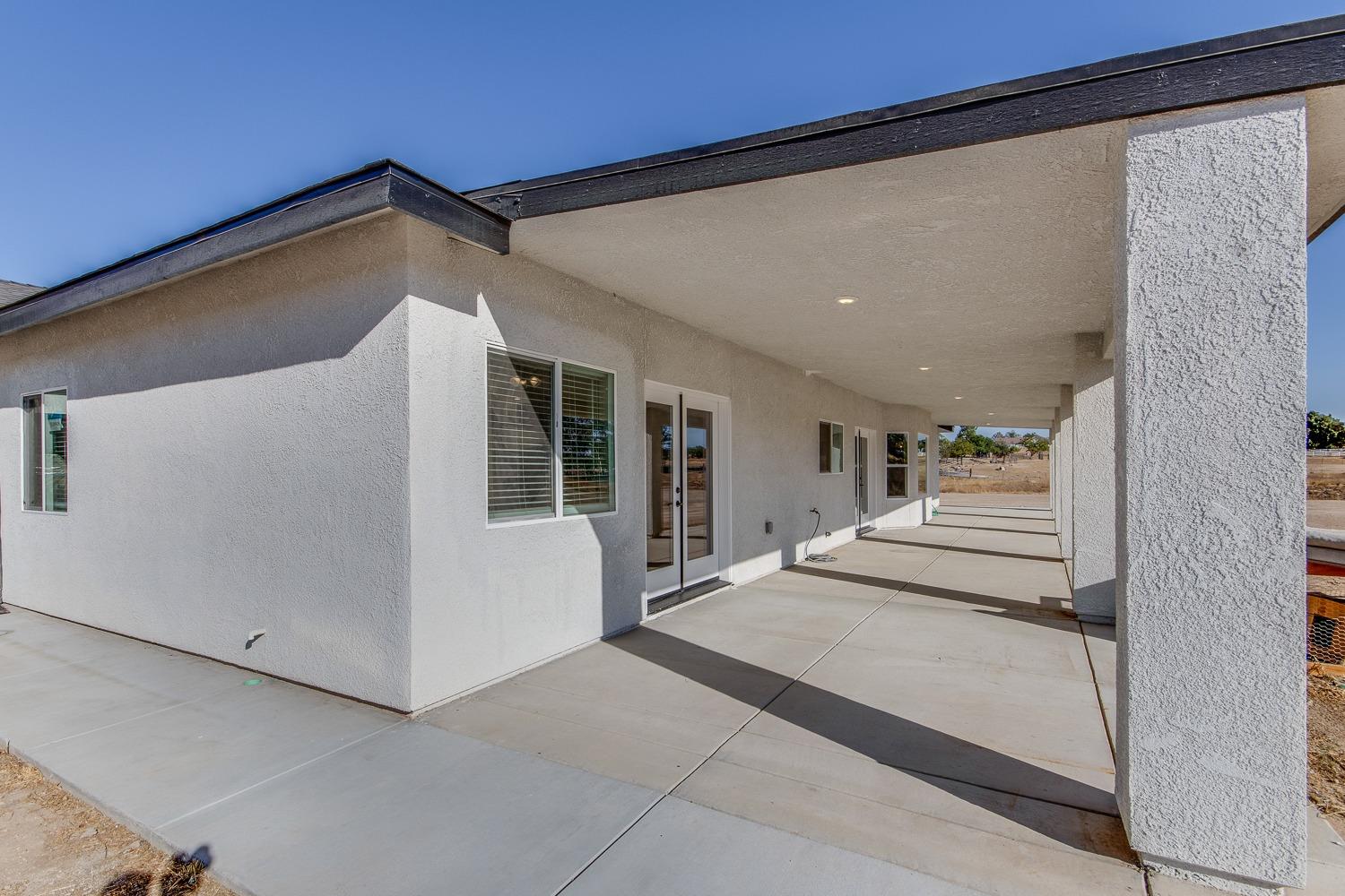16639 Mark Road Madera, CA 93636 - Photo 29 of 33 a view of a hallway with stairs