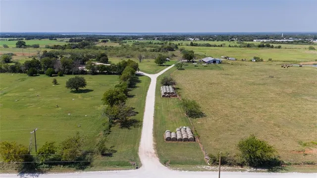 an aerial view of ocean residential houses with outdoor space