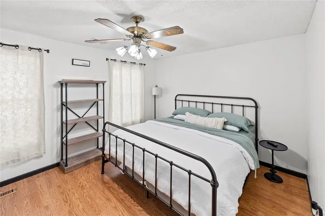 a bathroom with a double vanity sink mirror and
