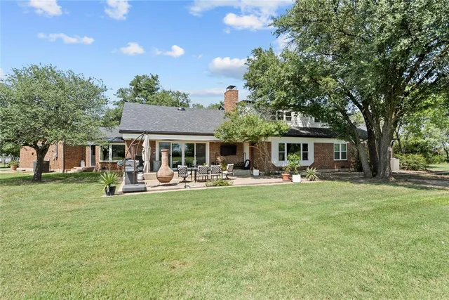 a view of a pathway both side of house